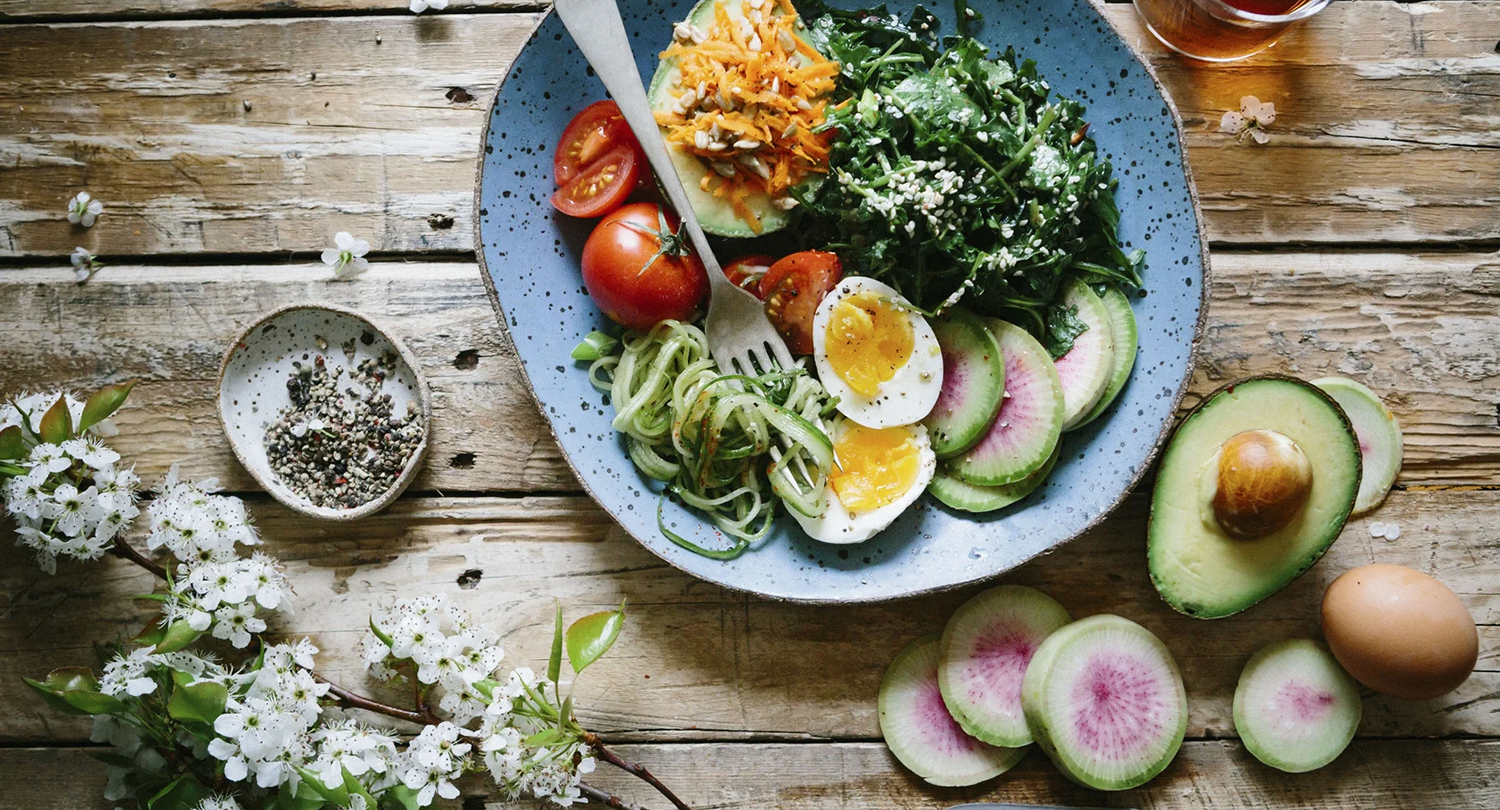 Photo of a table with a salad lunch