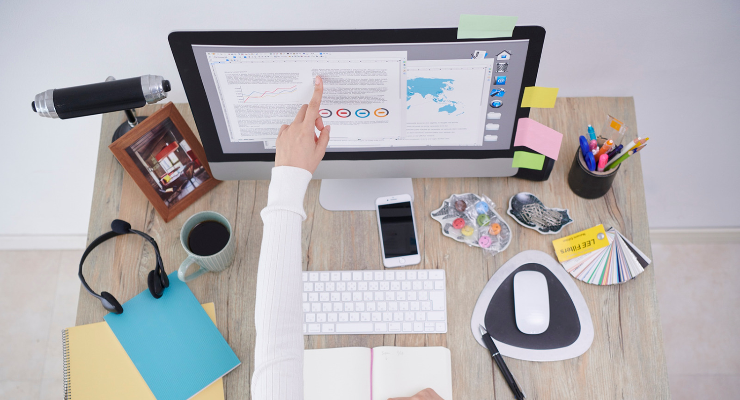 Photo of a woman working at a desk
